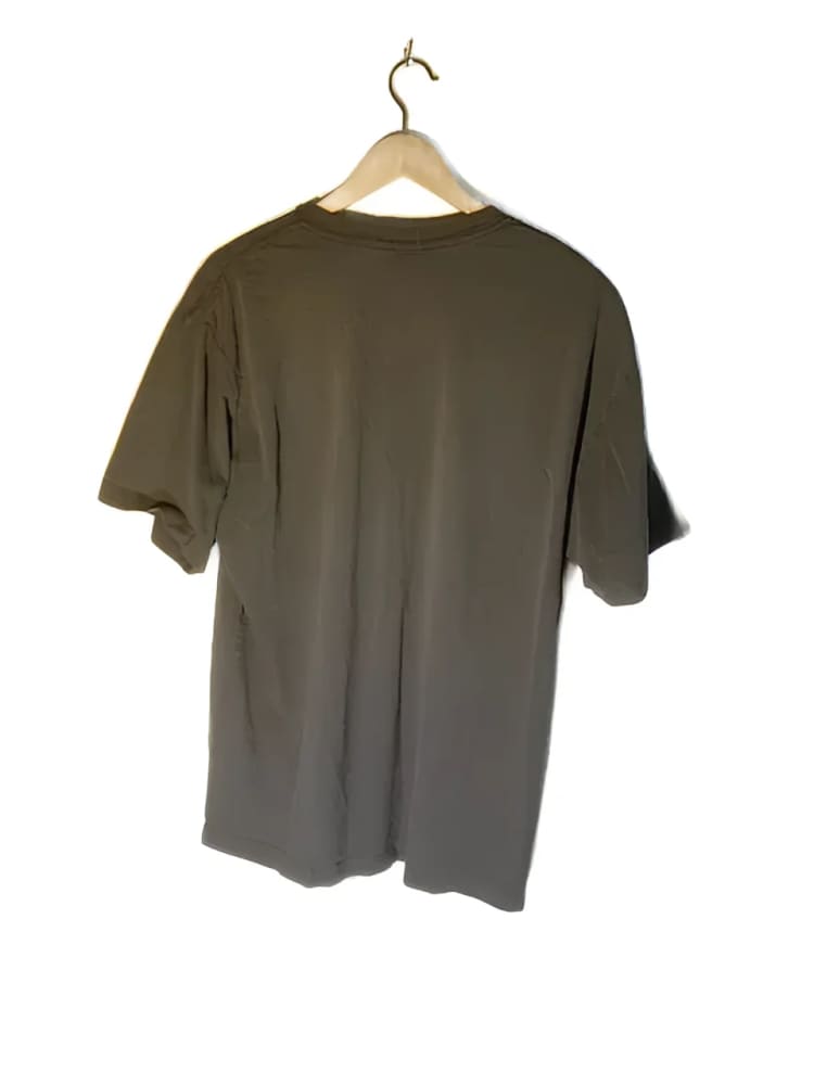 Olive green t-shirt on a hanger.