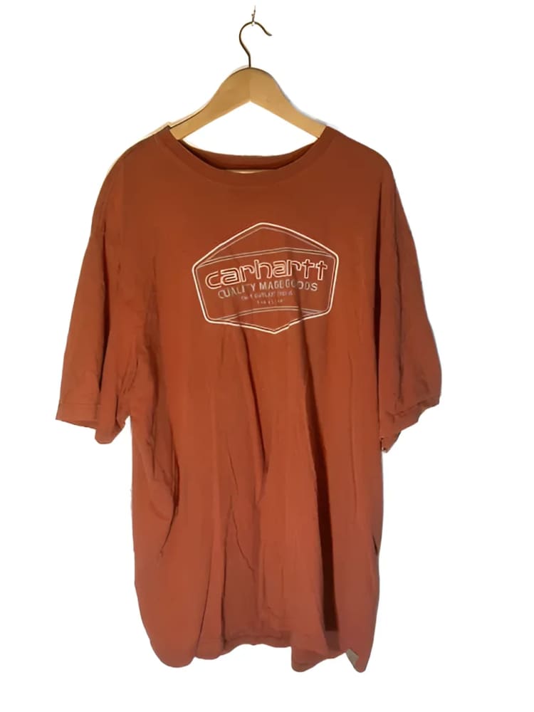 Rust-colored Carhartt t-shirt.