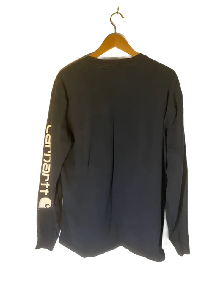 Black long-sleeved Carhartt shirt.