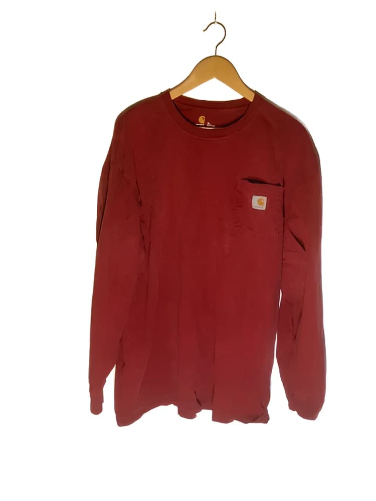 Maroon long-sleeved Carhartt shirt.