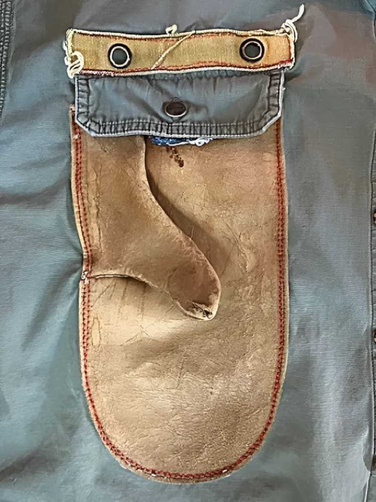 Close-up of vintage leather welder’s pocket on upcycled Carhartt American Worker Shirt by h.m. Peavy