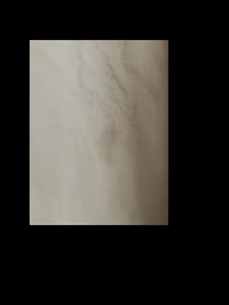 Beige marble tile.