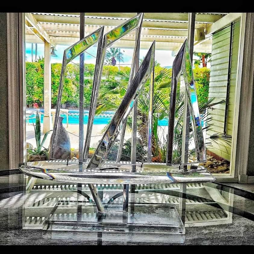 LIFE REGATTA IN THIS MID CENTURY SPECTACULAR DIAMOND CUTTED LUCITE.