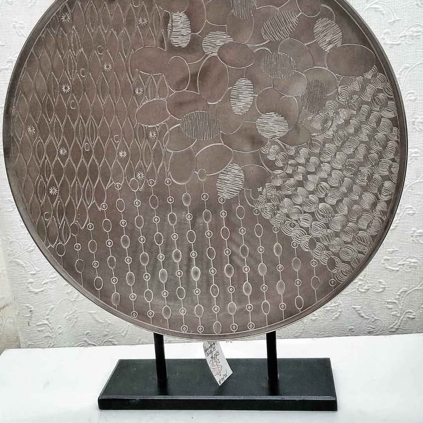 Fabulous Decorative Metal Accent. Beautiful design engraved on Aluminum on its wooden base.