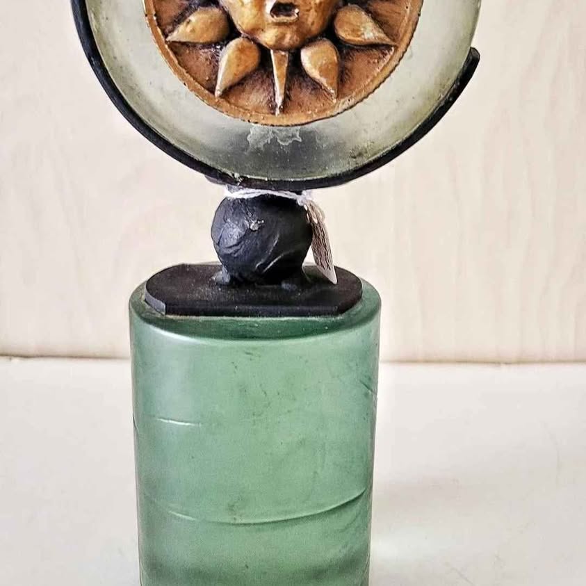 Heavy glass cilinder with sun candle holder