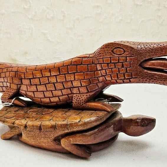 Surrealistic wood carving, DAVID ICKE conspiracy theory in african representation