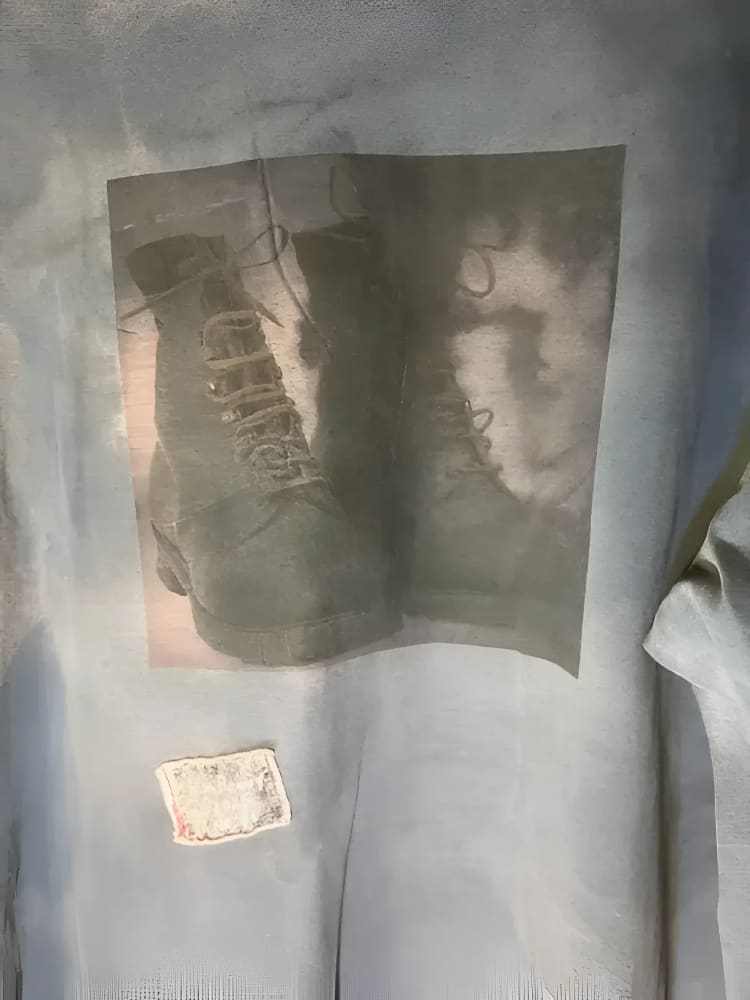 American Worker T-shirt in dusty blue with black work boots print and leather snap pocket on upcycled Carhartt fabric by h.m. Peavy