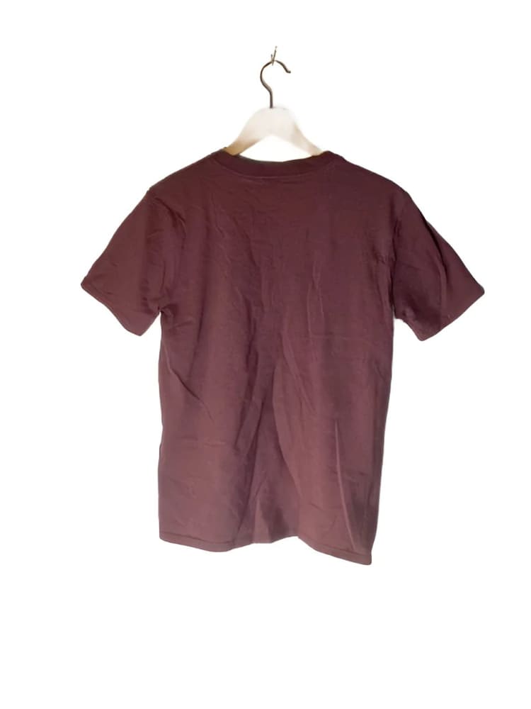 Maroon short-sleeve crewneck t-shirt on a hanger.