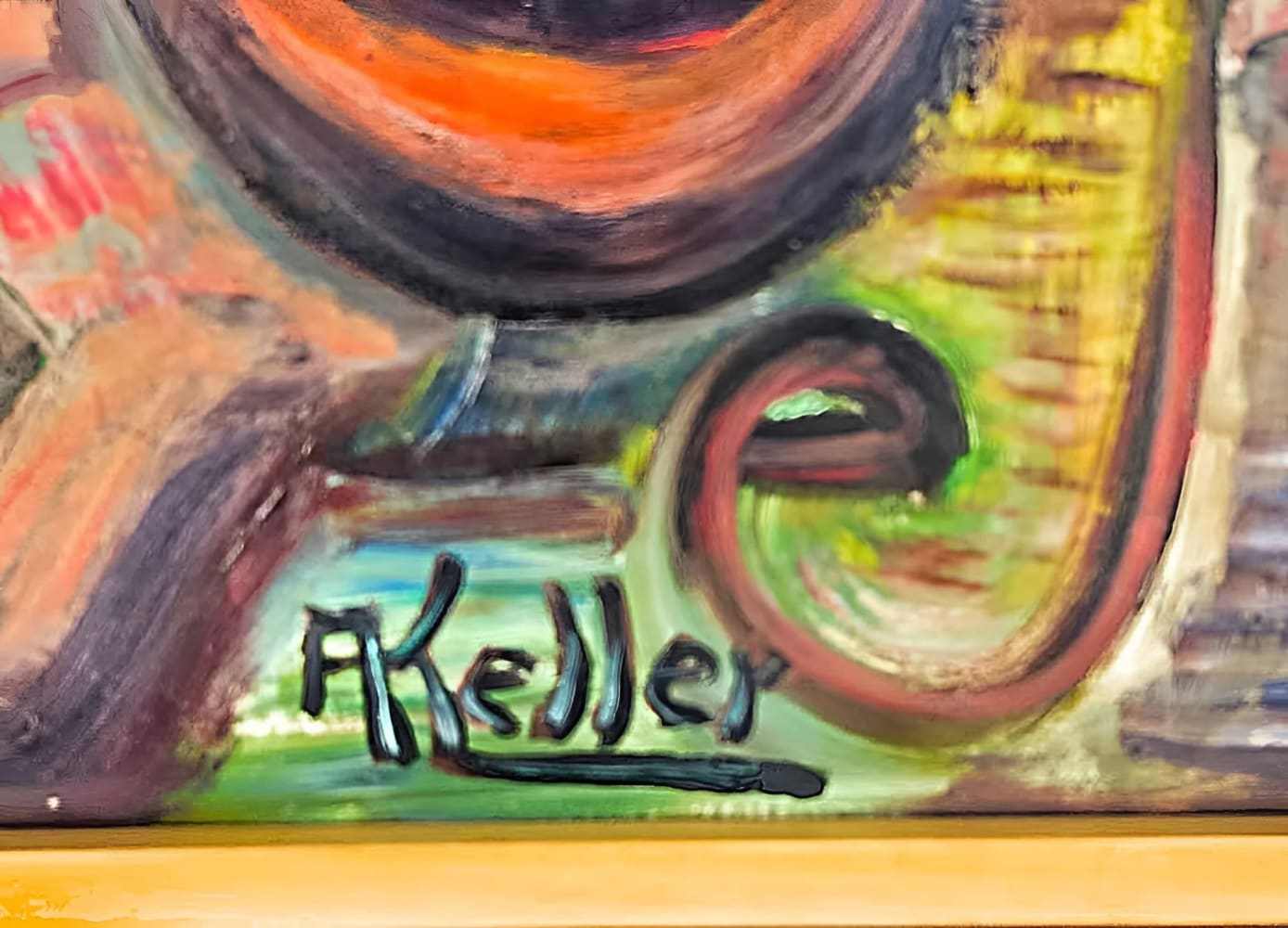 Close-up of A. Keller's signature on a 1970s abstract acrylic painting with vibrant colors and textured brushstrokes