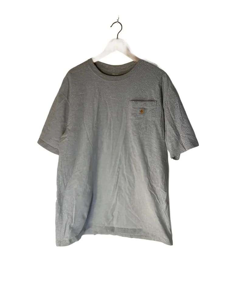 Grey short-sleeved t-shirt with a chest pocket.