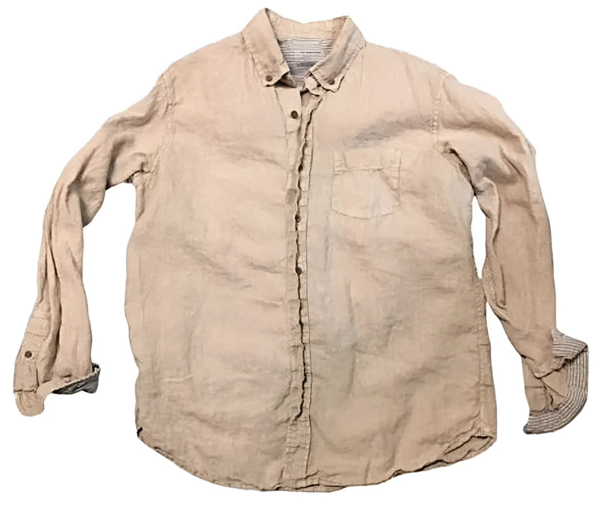Wrinkled, long-sleeved, button-down shirt.