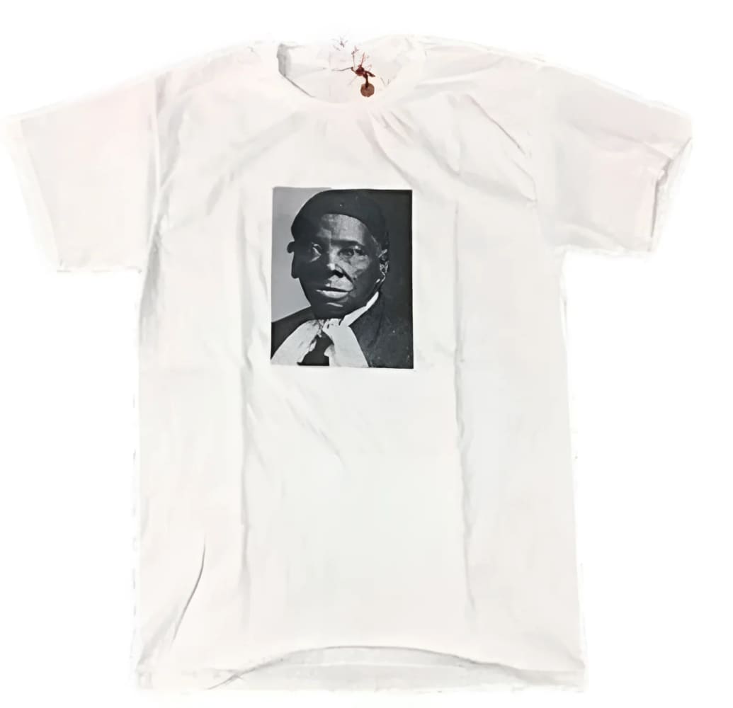 White t-shirt with black and white portrait.