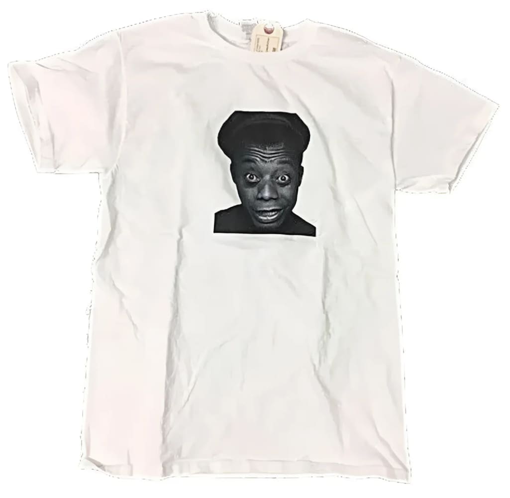 White t-shirt with a black and white portrait.