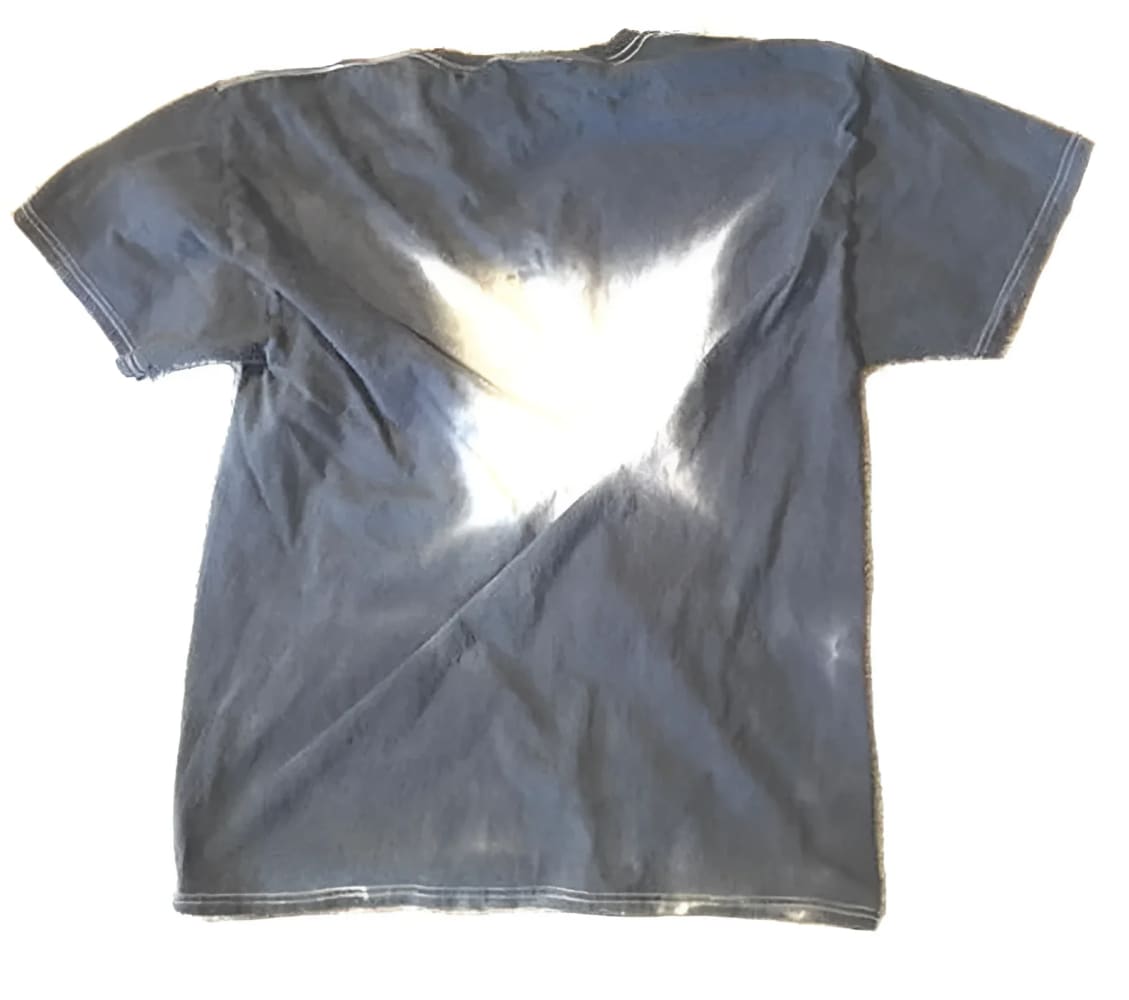 Gray t-shirt with bleach stain.