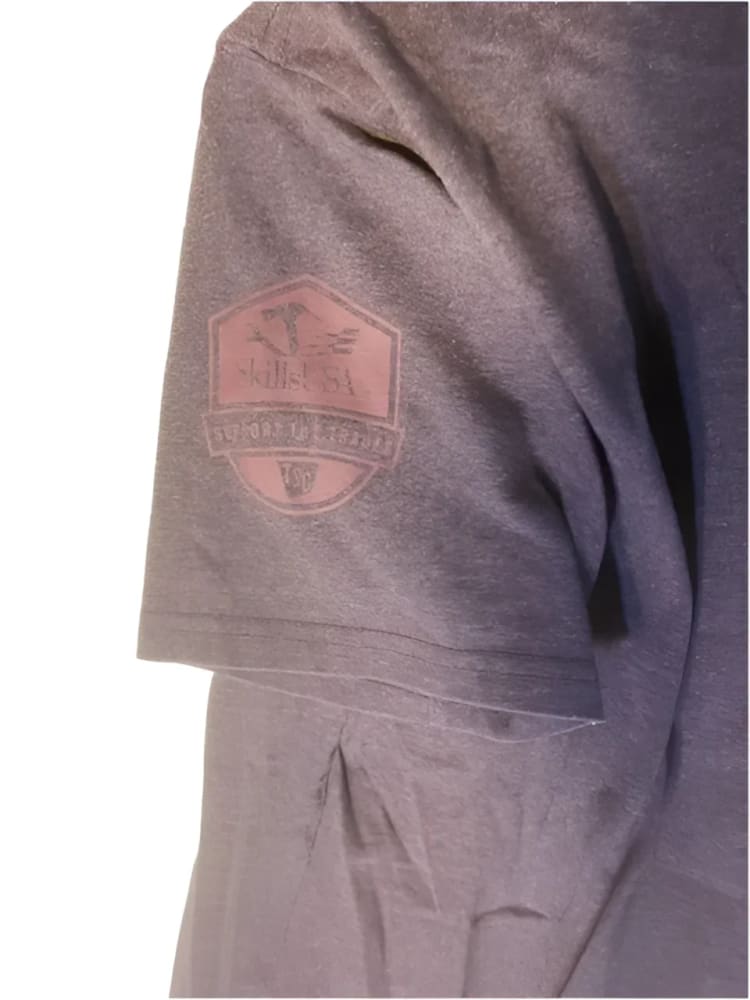 A short-sleeved, heather grey t-shirt with a maroon hexagonal patch on the left sleeve.