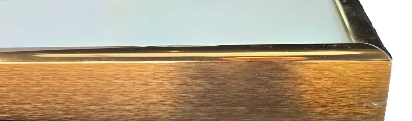 Close-up of gold and wood frame corner for Diane Hansen Metamorfosi signed etching artwork