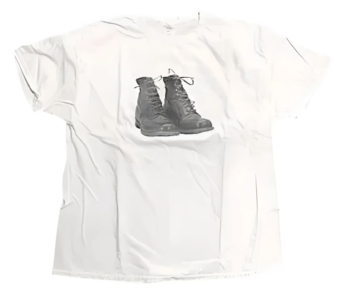 White t-shirt with combat boots graphic.