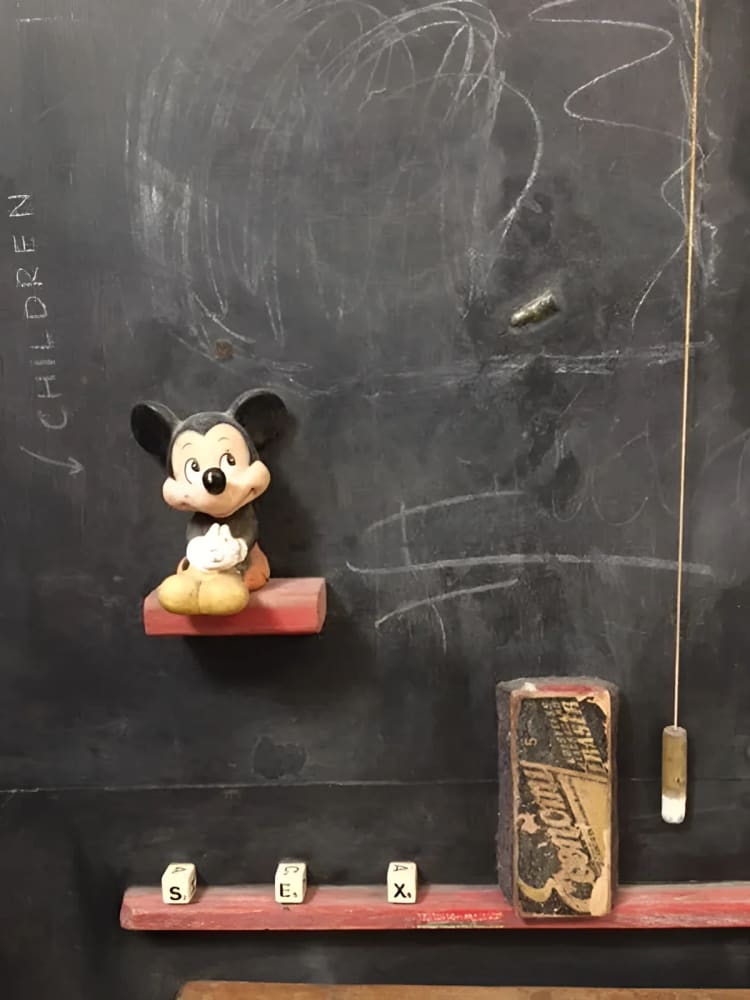 Vintage Mickey Mouse figurine.