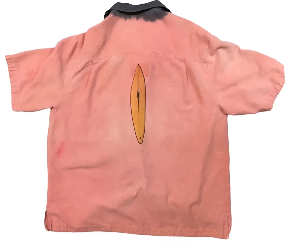 Pink short-sleeved shirt with surfboard design.