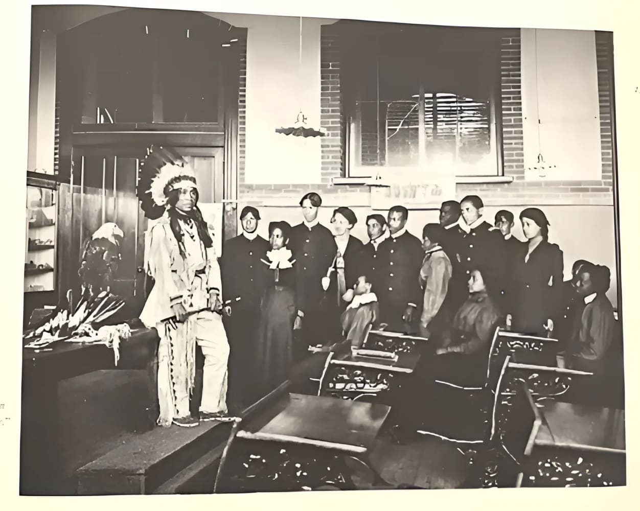Black and white classroom scene.