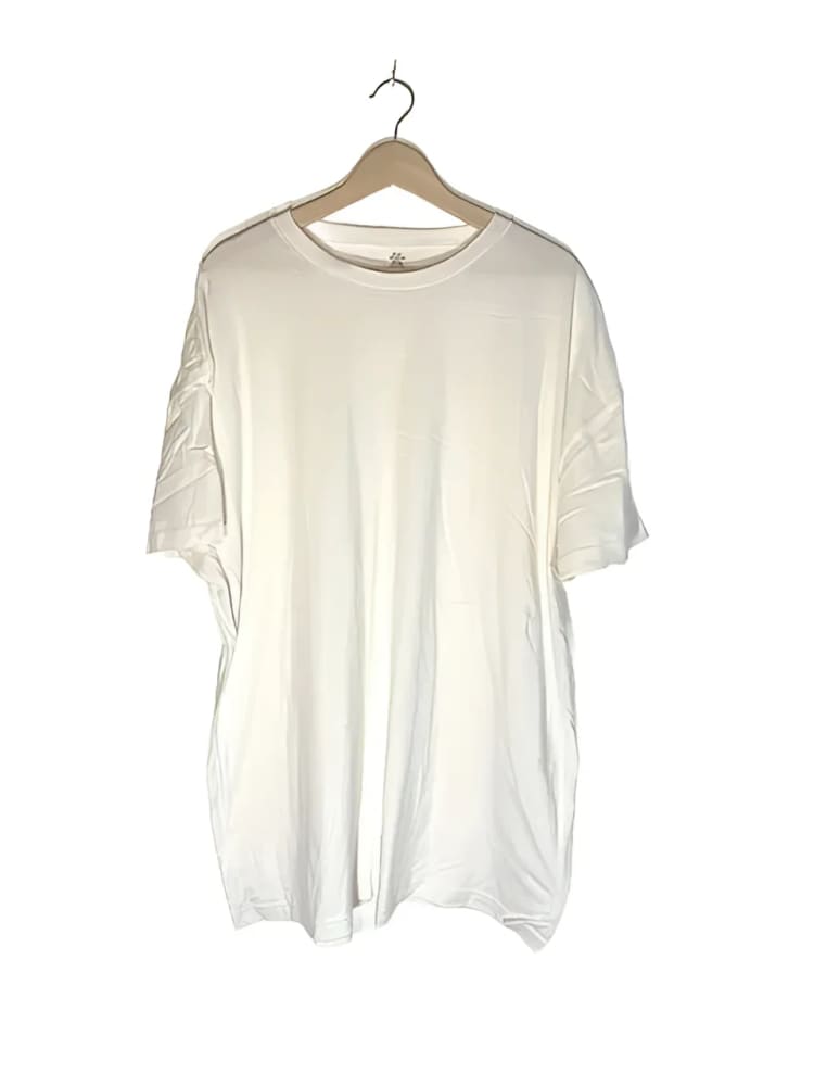 White short-sleeved t-shirt on a hanger.