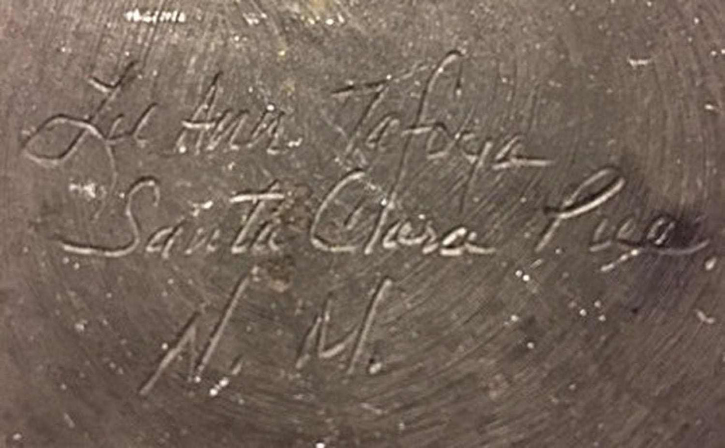 Signature engraving of LuAnn Tafoya on blackware pottery bowl from Santa Clara Pueblo New Mexico