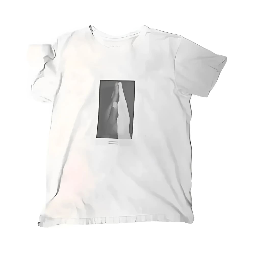 A white short-sleeved t-shirt with a black and white print of praying hands on the front.