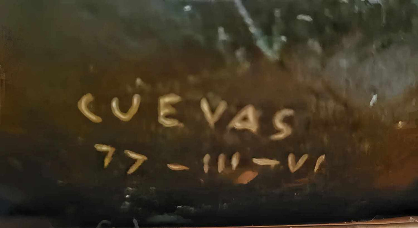 Close-up of Jose Luis Cuevas signed bronze sculpture with artist's signature and date engraving