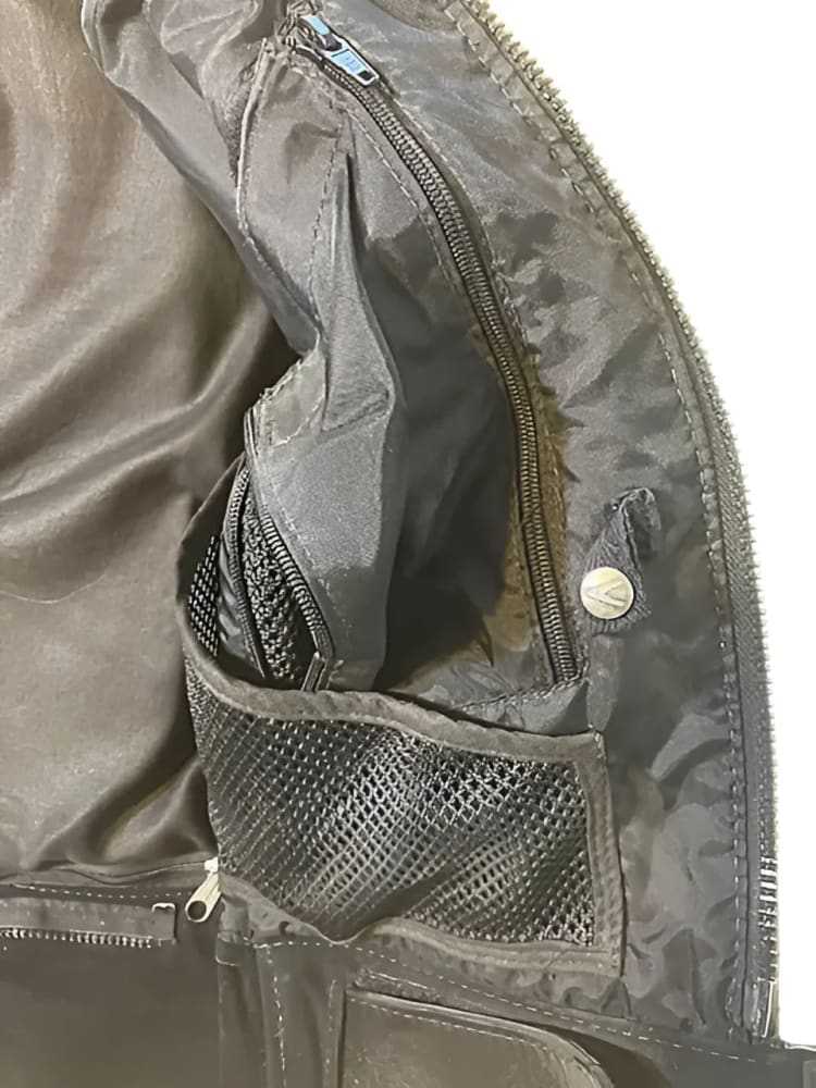 Vanson women's vintage black leather moto jacket interior with zippered and mesh pockets
