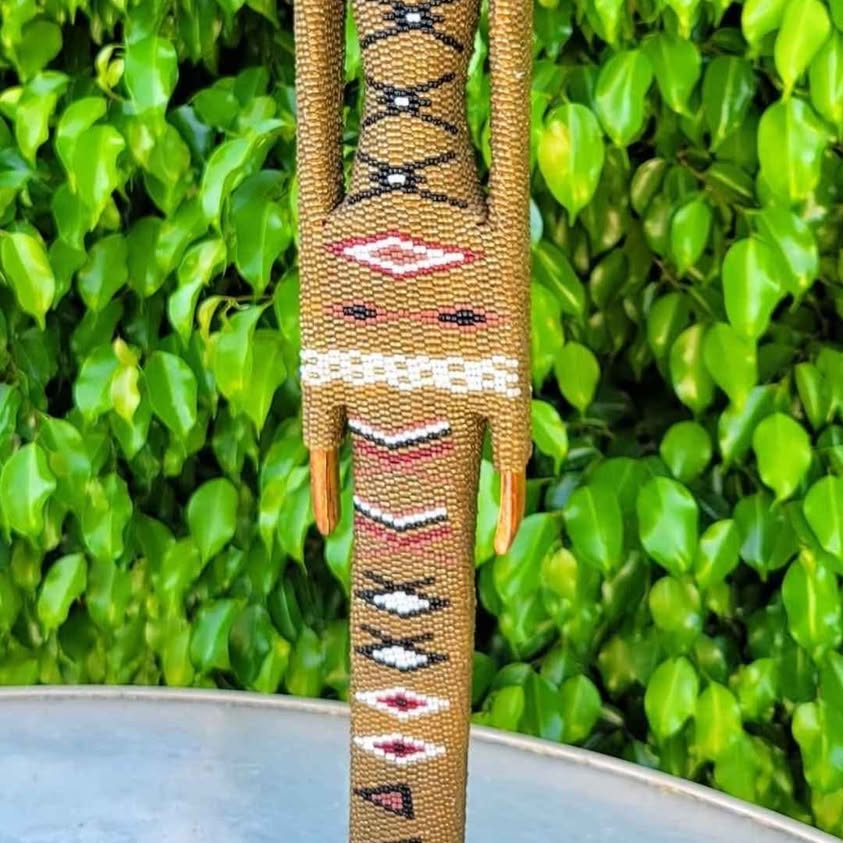The African Beaded Doll is a hand-carved TALL FULL DRESSED BEADED WOOD CARVING DOLL
