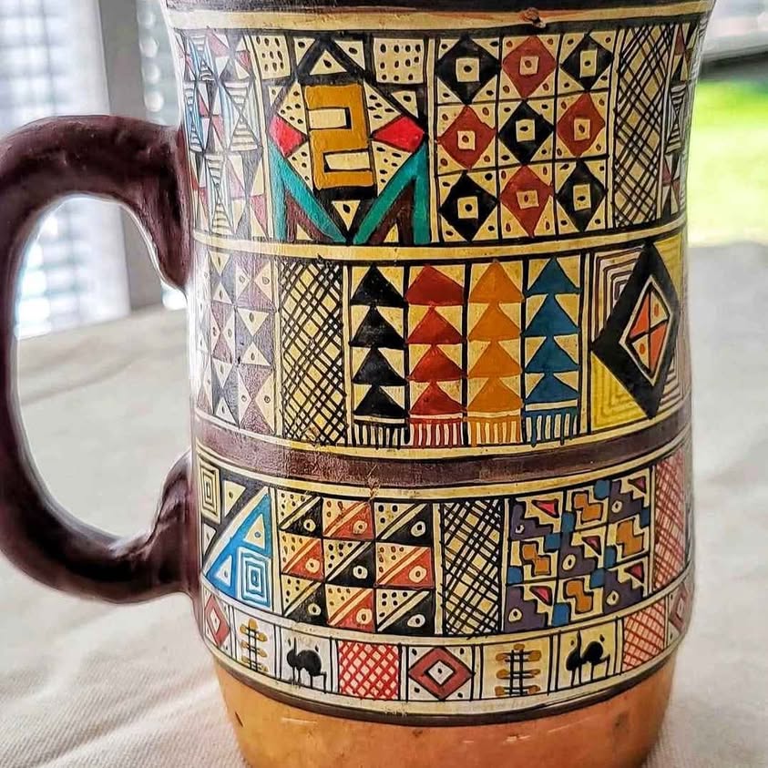 YOUR MORNING COFFEE IN A PERUVIAN TERRACOTA HAND MADE AND PAINTED MUG
