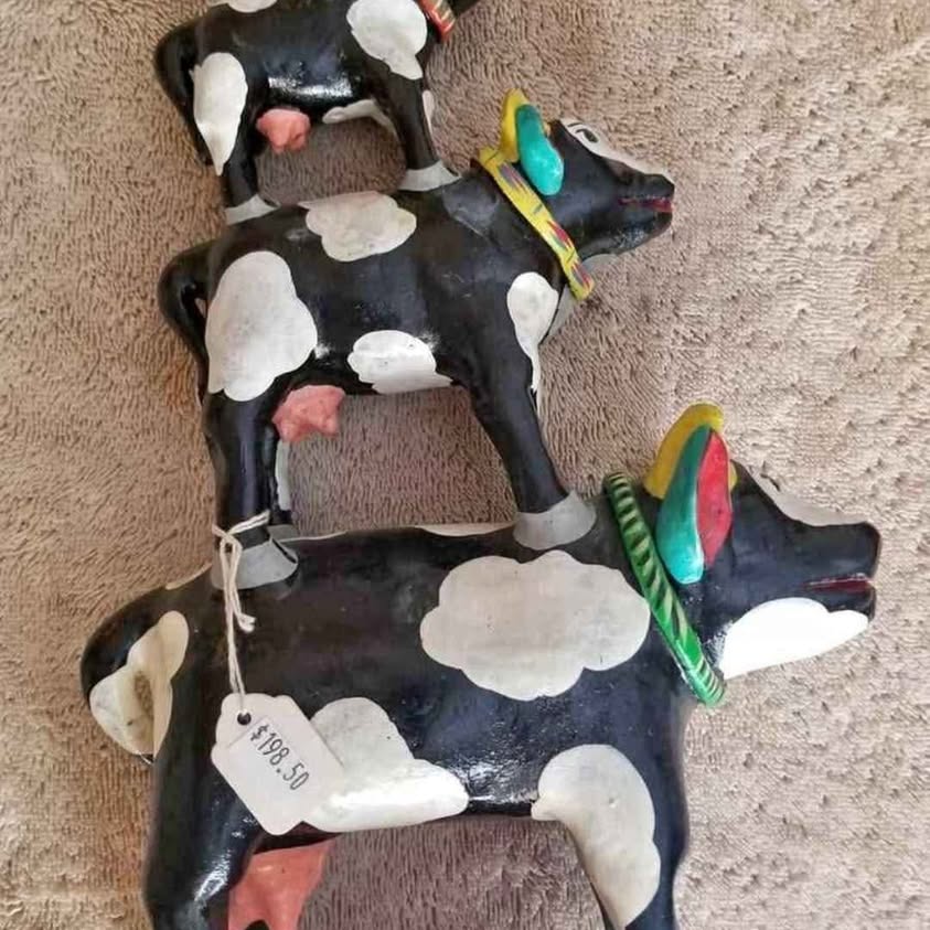 Three cows and one rooster Tower, Betus Clay