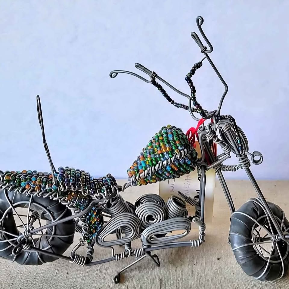 2 HARLEY SCULPTURES IN BEADED WIRE WITH RUBBER FROM AFRICAN ARTISTS