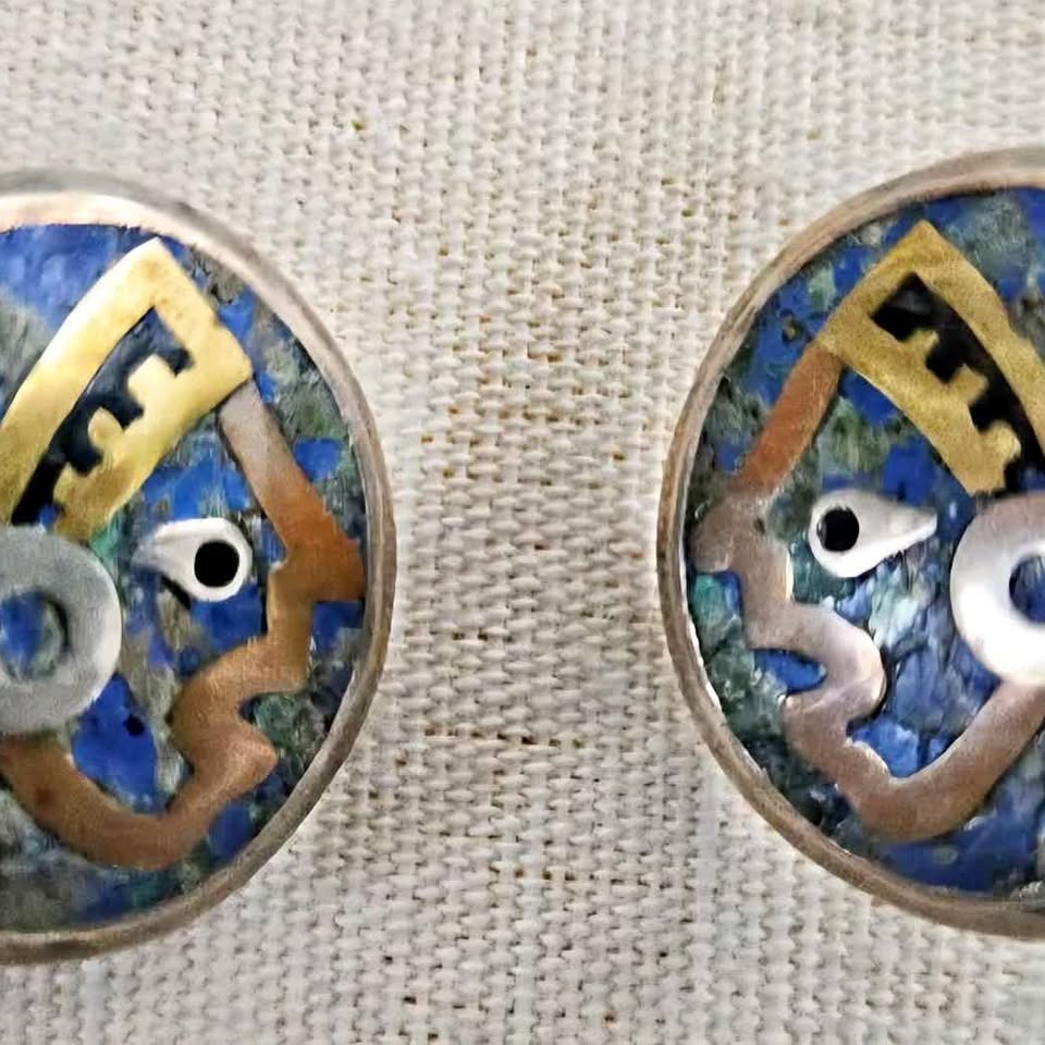 Taxco, Mexico pair of screw earrings, likely crafted from silver .925 as stamped in the back