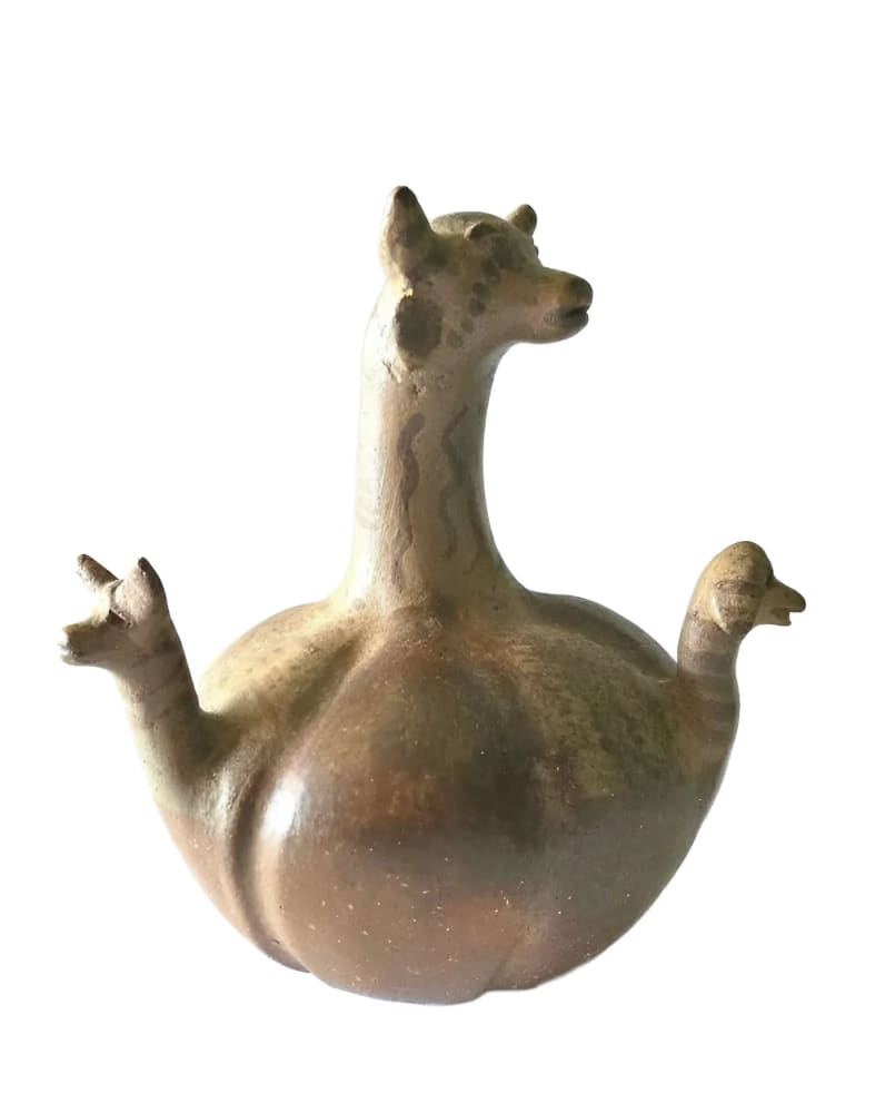 Ancient animal-shaped ceramic vessel with three heads