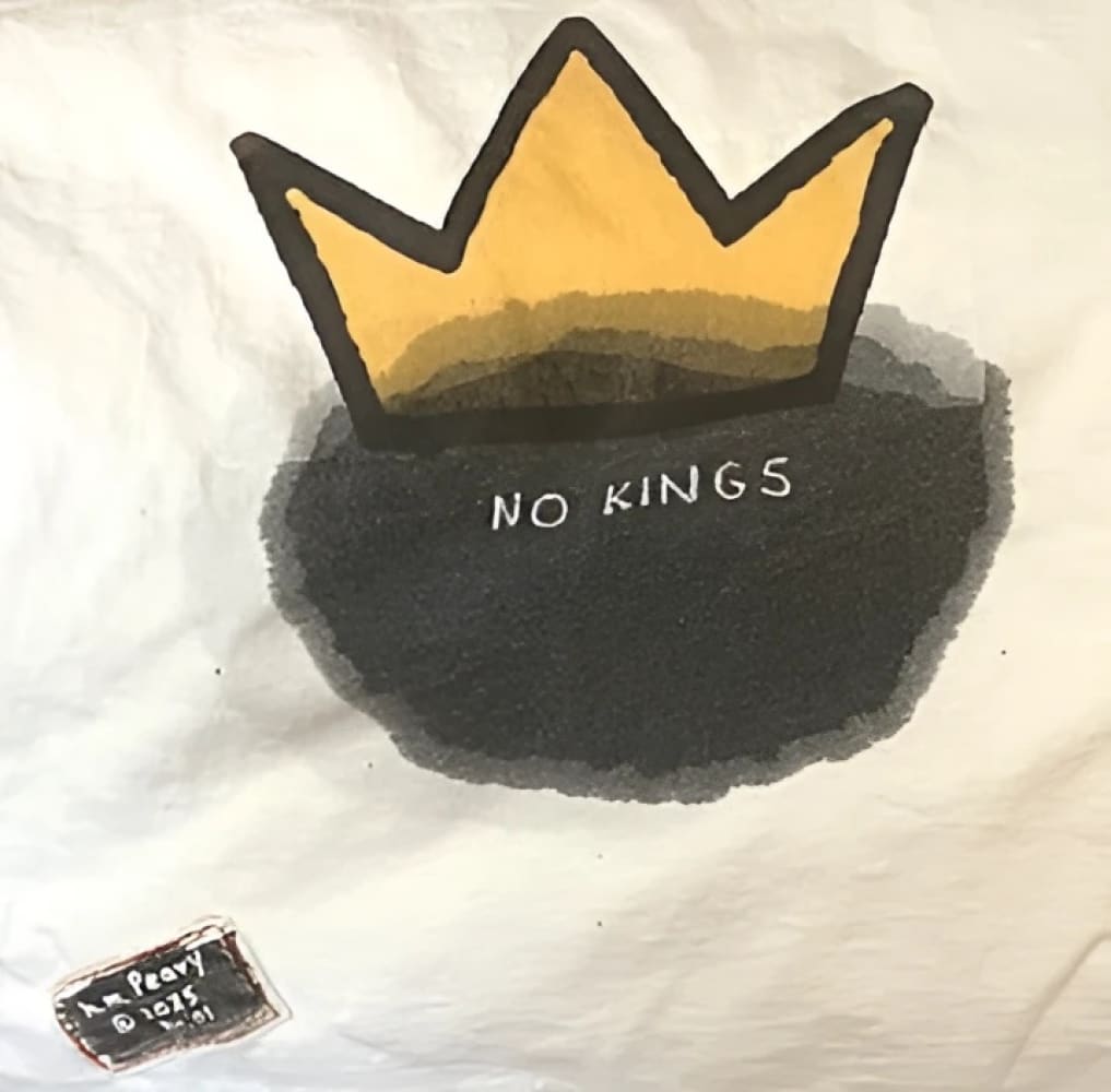 Yellow crown design on white background with black shadow effect.