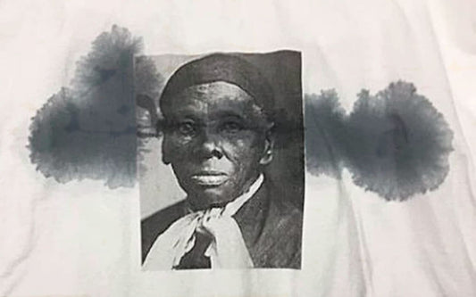 Harriet Tubman graphic tee with ink stains.