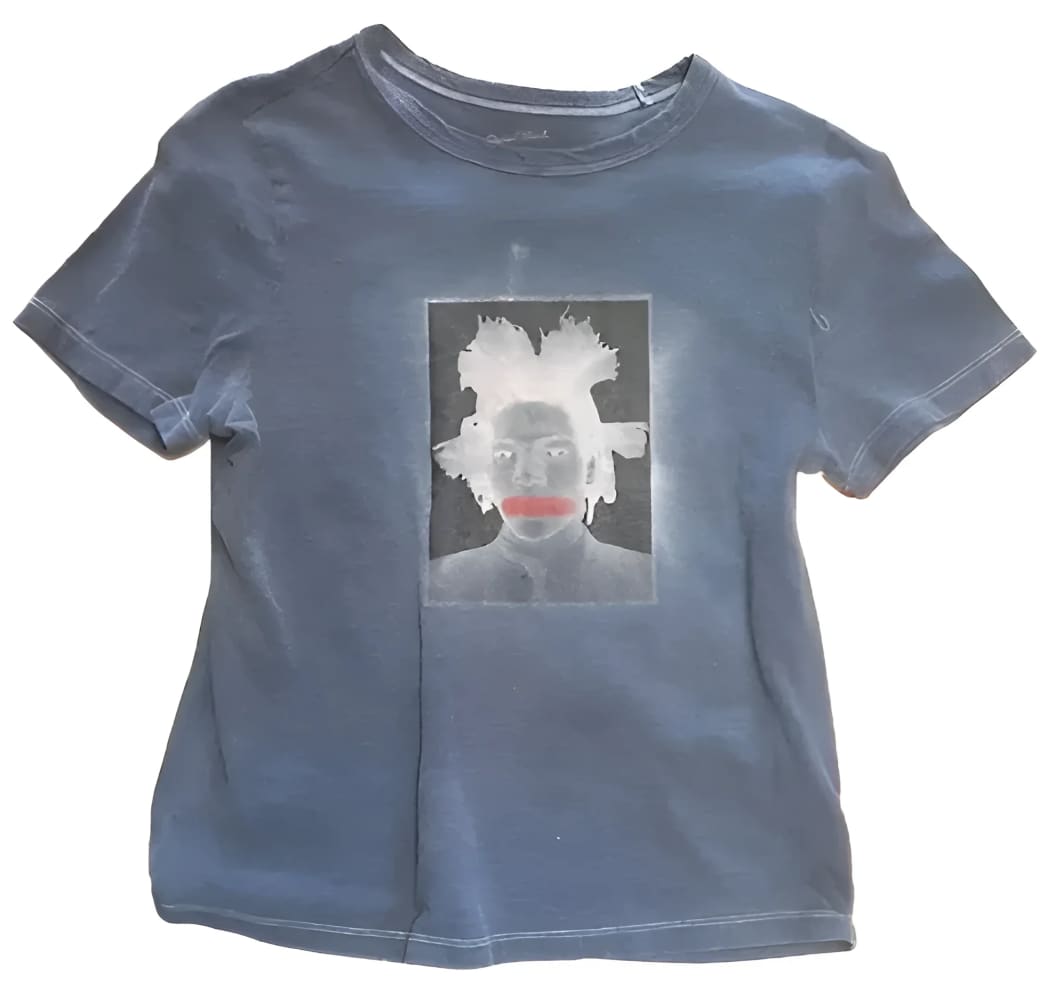 Blue t-shirt with a portrait graphic.
