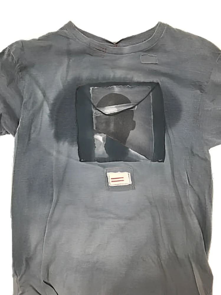 Gray t-shirt with graphic.