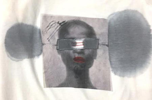 Artistic t-shirt with a portrait and obscured eyes.
