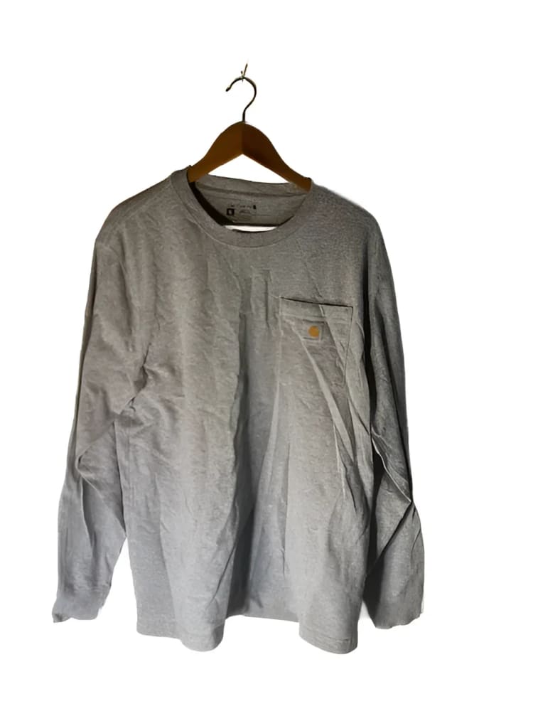 Grey long-sleeved Carhartt t-shirt with a chest pocket.