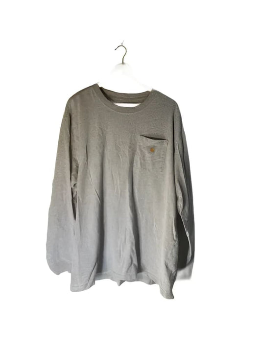 A long-sleeved, crew-neck, light brown or grey t-shirt with a small chest pocket.