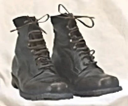 Pair of black, laced-up leather boots.