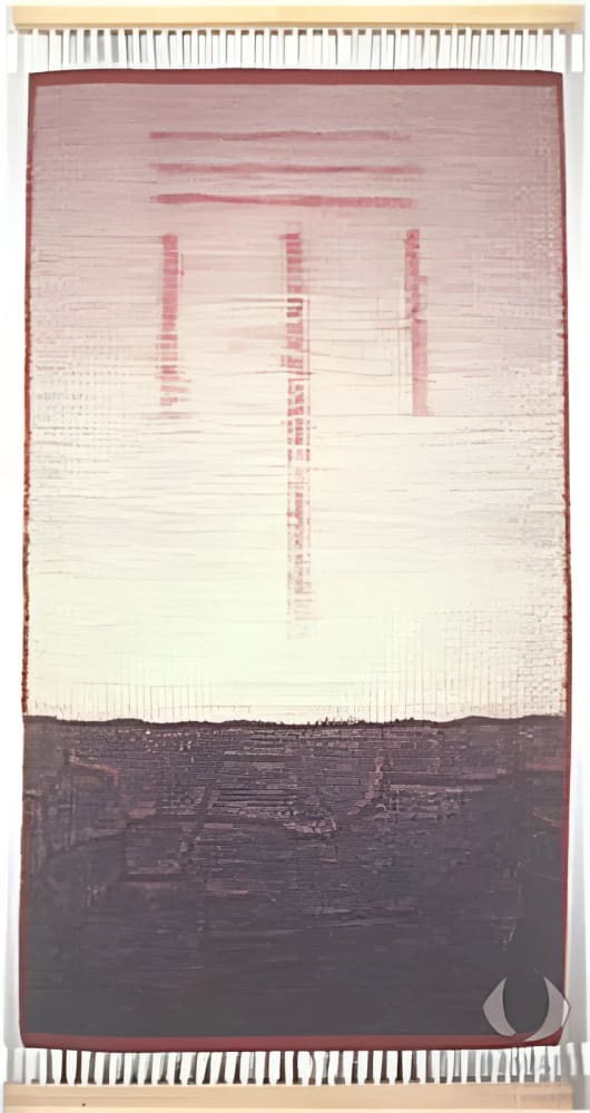 Woven wall hanging with geometric design.