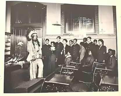 Black and white classroom scene.
