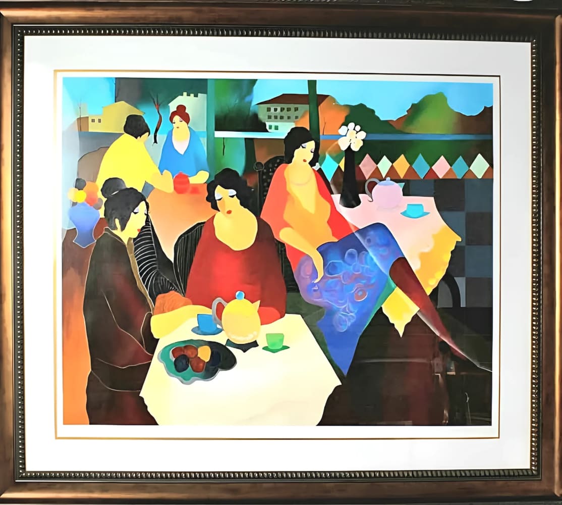 Framed painting of women at tea.