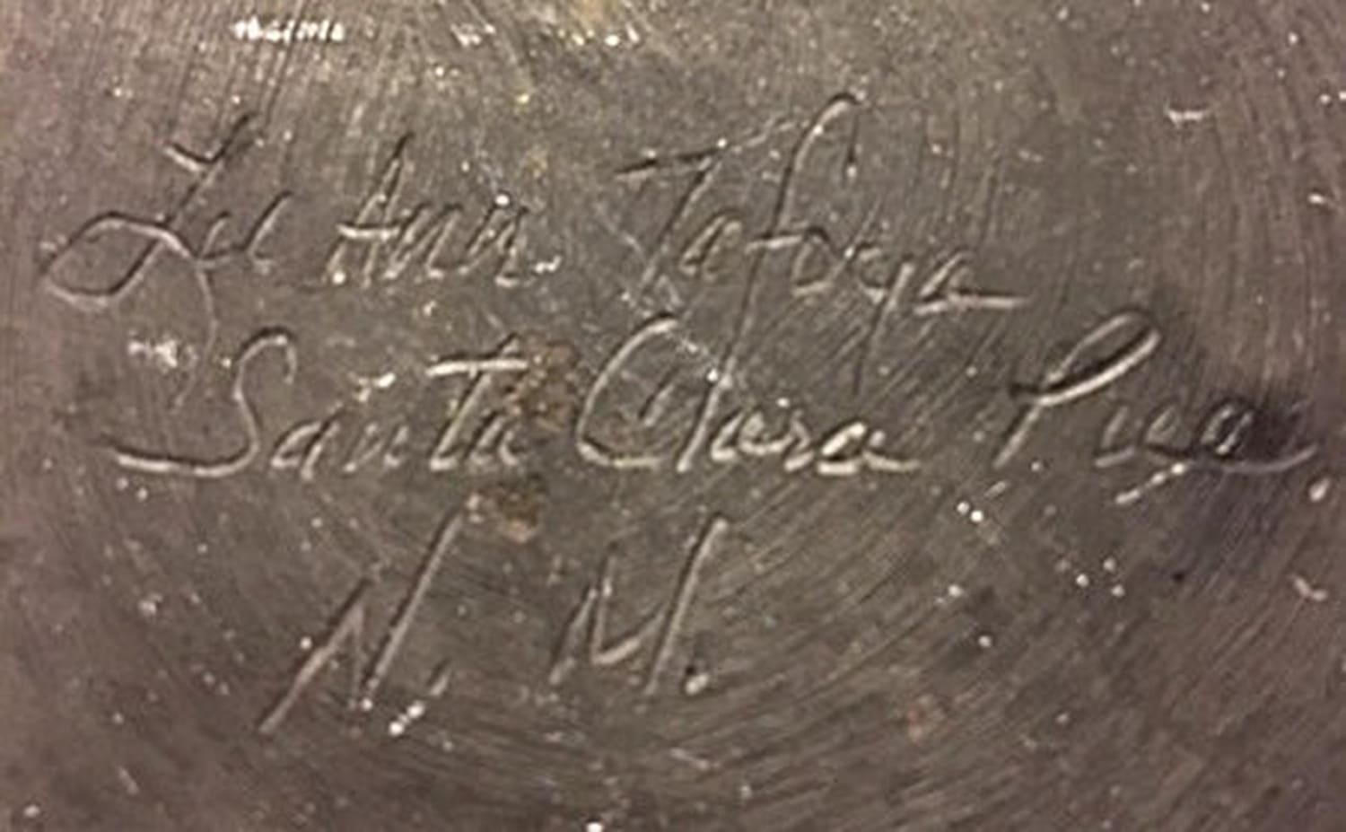 Inscribed pottery base.
