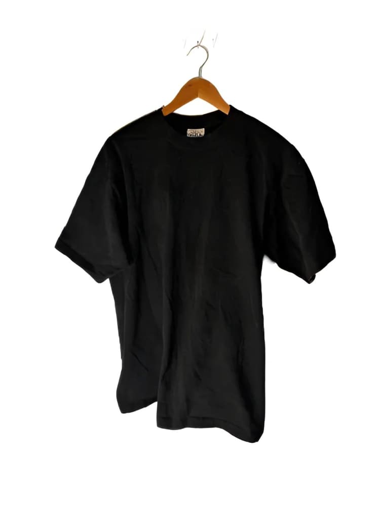 Black short-sleeved t-shirt on a wooden hanger.