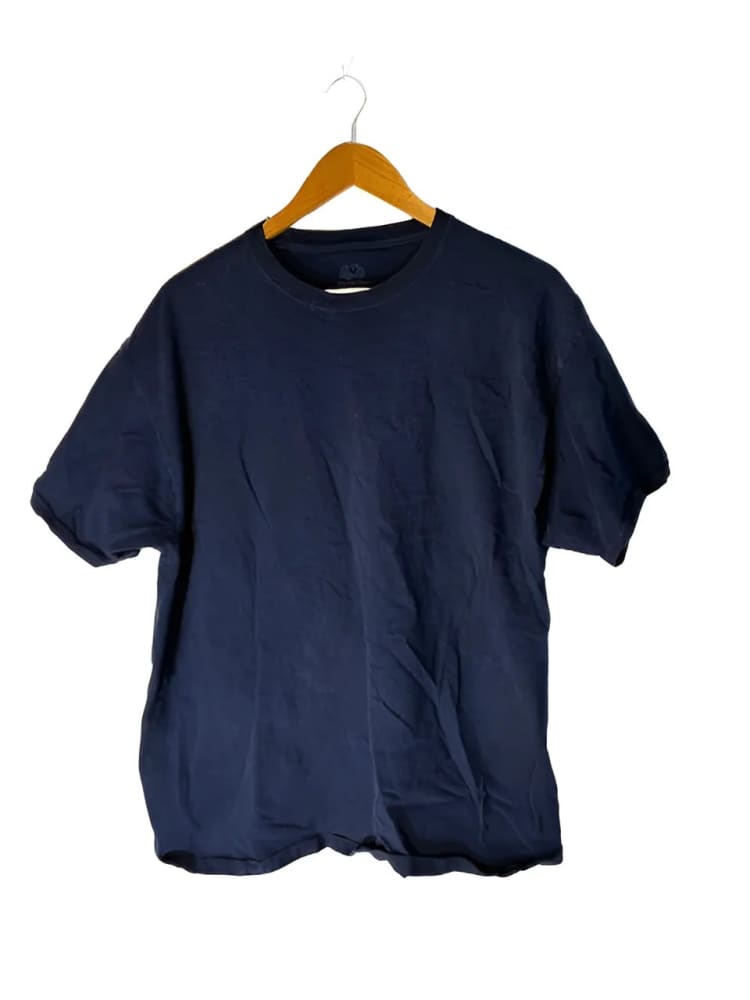 Navy blue crew-neck t-shirt on a wooden hanger