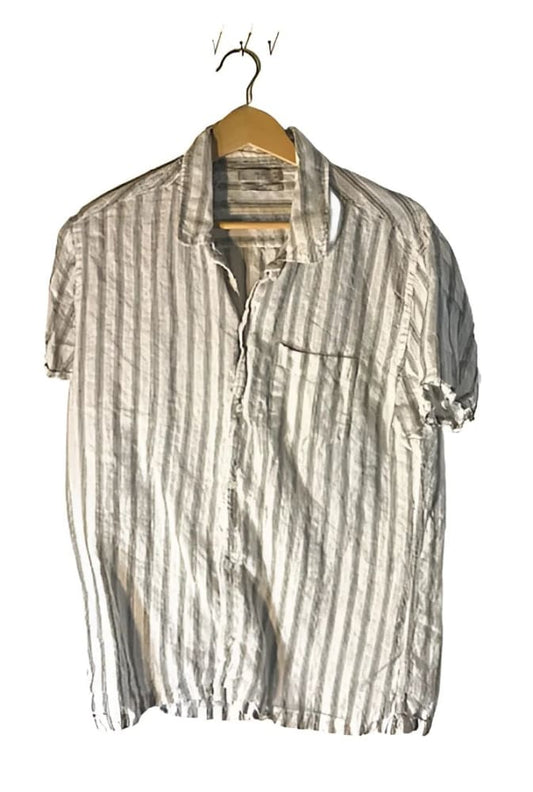 Men’s short-sleeve striped linen shirt on a hanger.